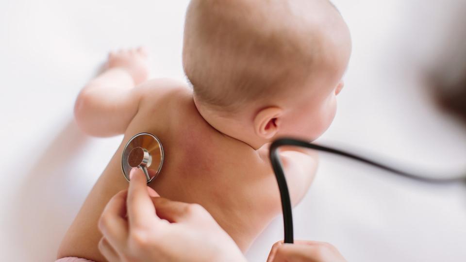 A child with a stethoscope